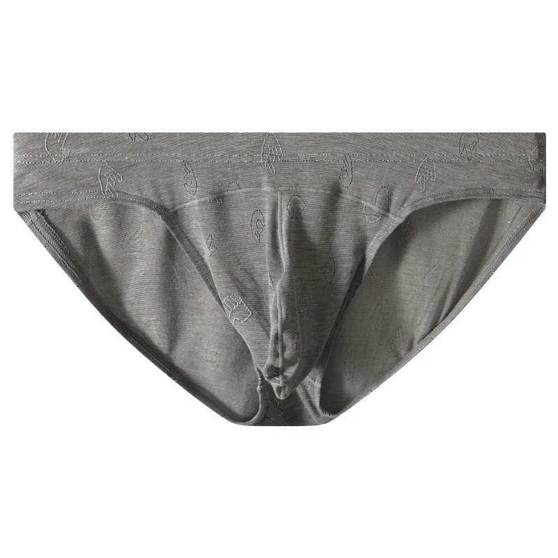 Modal low waist jacquard briefs in colourful blue on a grey background.