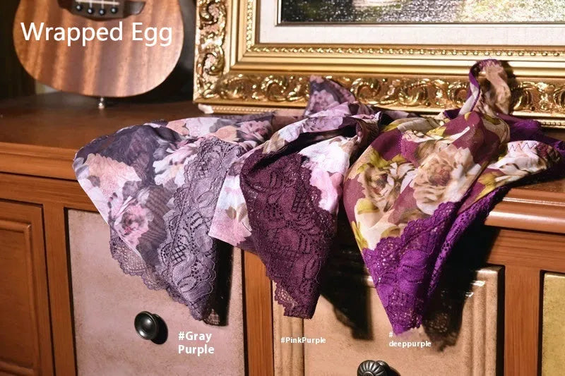 Men's printed ice silk mesh underwear briefs in multiple colours on a mid-waist mannequin.