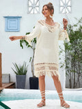 Apricot coloured hand-crocheted women's long beach dress with a solid lining.