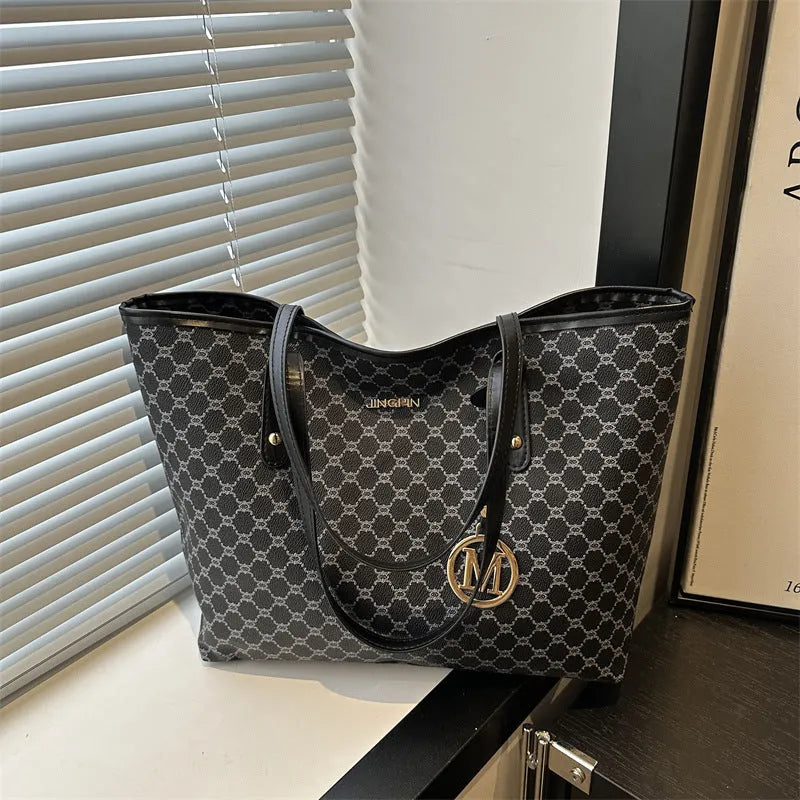 PU material shoulder bag in street-trend style with sewing thread detail, shown in black.