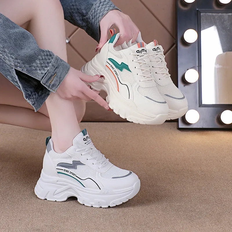 Women's white height increasing dad shoes with cross shoulder straps and rubber sole