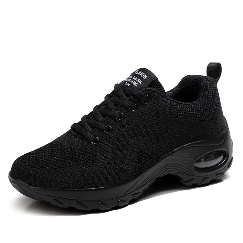 Red and black women's low-top lace-up mesh sneakers with a round toe and mid heel on a PU sole.