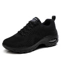 Red and black women's low-top lace-up mesh sneakers with a round toe and mid heel on a PU sole.