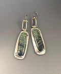 Geometric alloy earrings with two-colour marble pattern and simple styling