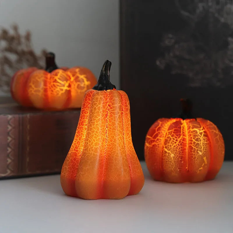 Three Halloween pumpkin lanterns in short, medium, and long sizes with LED illumination and realistic surface cracks