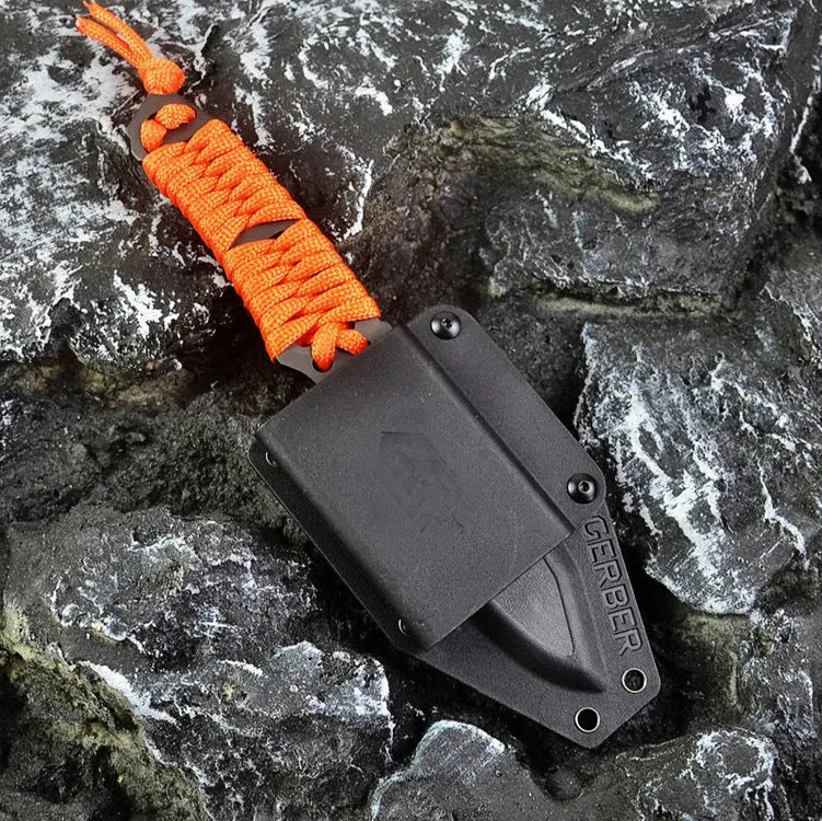 Multi-function survival knife with straight blade and rope handle showing ABS sheath