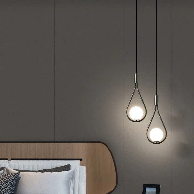 Modern minimalist copper bedside chandelier with a choice of three shade colours and a tricolour light source.