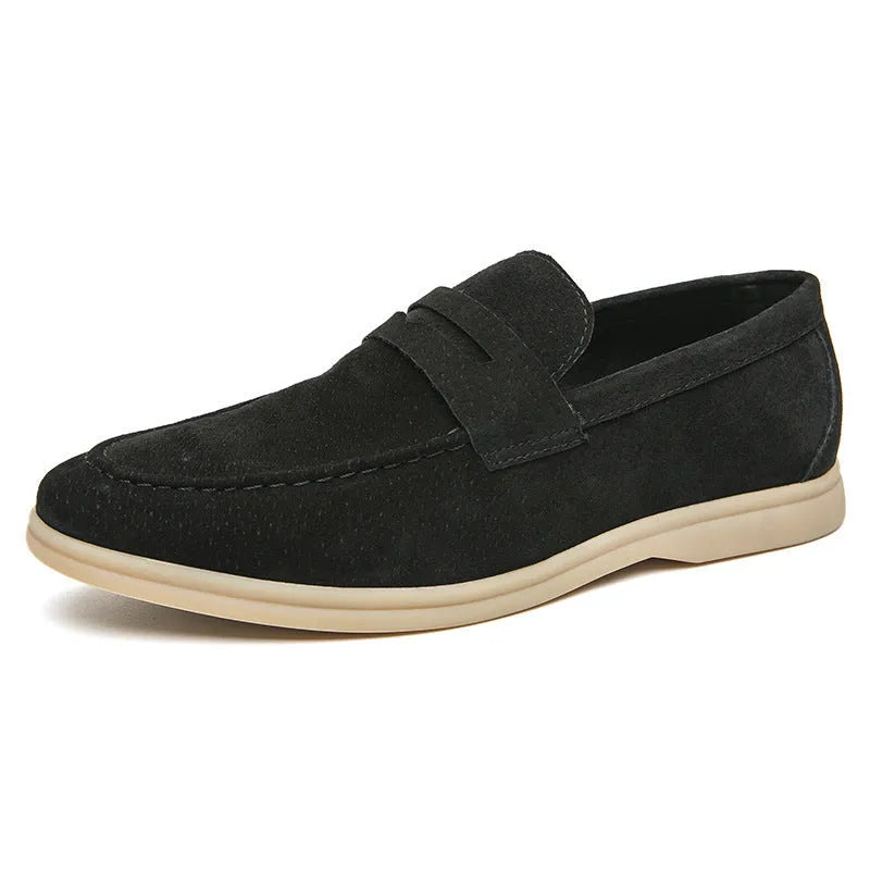 Men's beige leather slip-on casual shoes with a round toe and rubber sole.