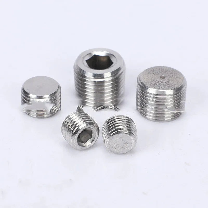 Stainless steel hexagon plug for 3/8 inch pipe bulkhead fitting on a white background