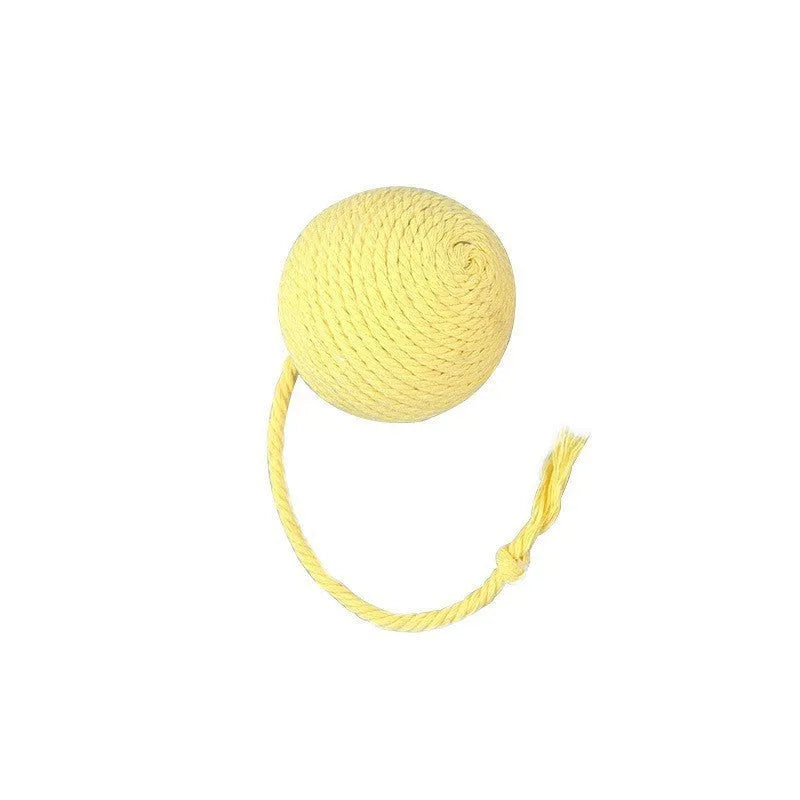 Cat toy ball with integrated rope and bell in green pink purple yellow colours