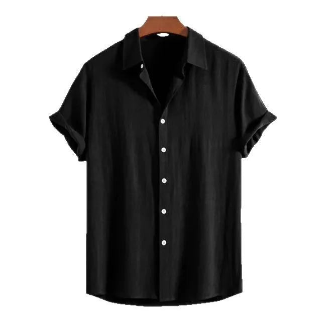 Man wearing a loose, short-sleeve cardigan in a solid colour, suitable for casual summer wear.