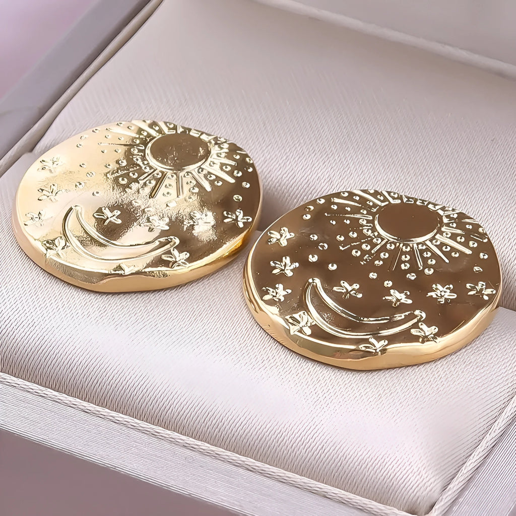 304 stainless steel earring studs with geometric shell designs in gold and silver finishes