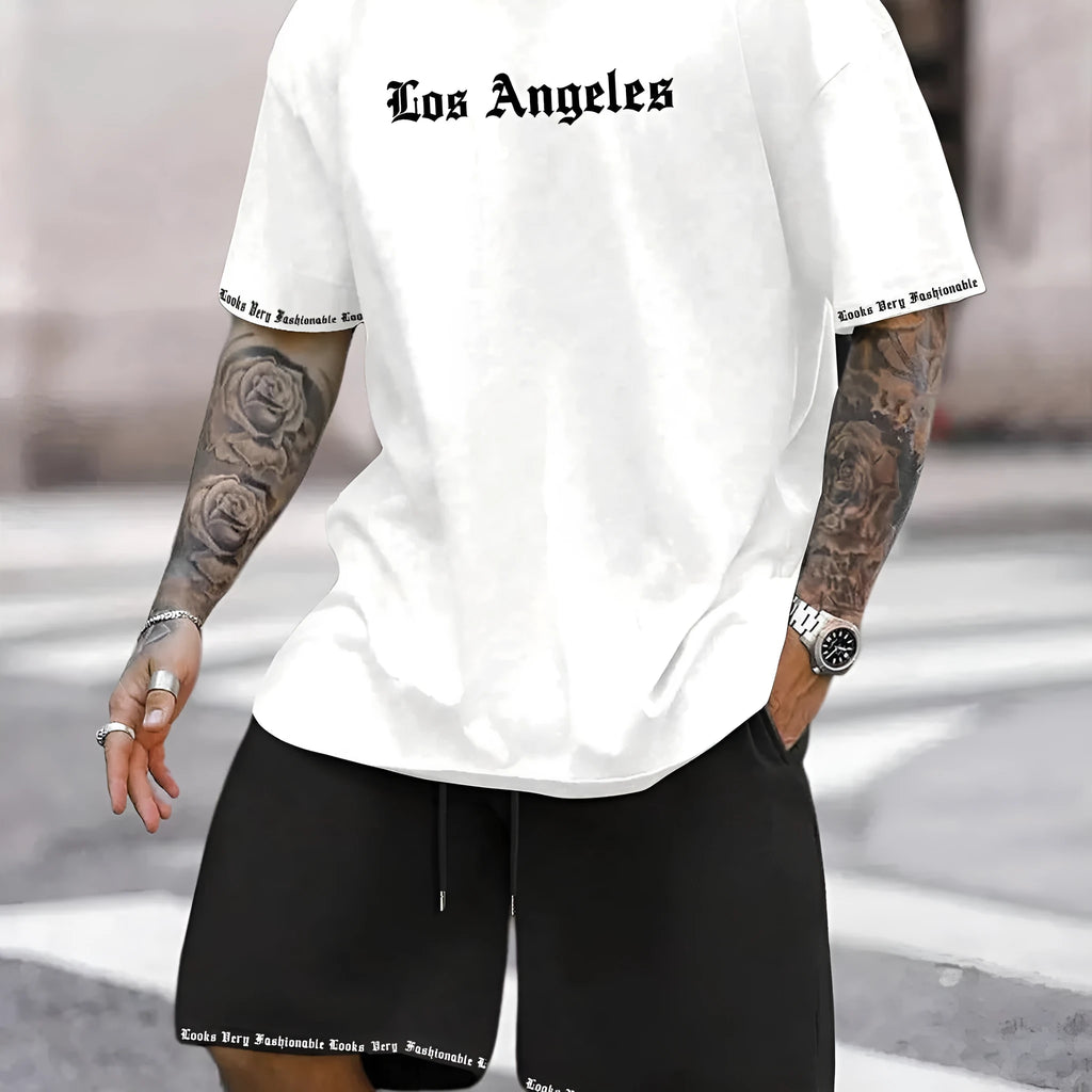 Men's blue printed short sleeve top and matching shorts sports set laid flat