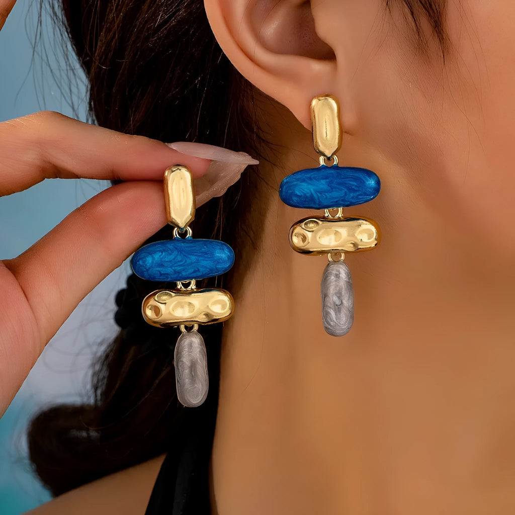 Geometric zinc alloy stud earrings with electroplated multicolour finish and butterfly fastenings