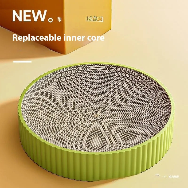 Round green cat scratching board with corrugated cardboard surface measuring 55 cm across