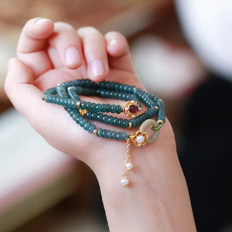 Blue water jade abacus bead bracelet with tourmaline rings and pearls on elastic string