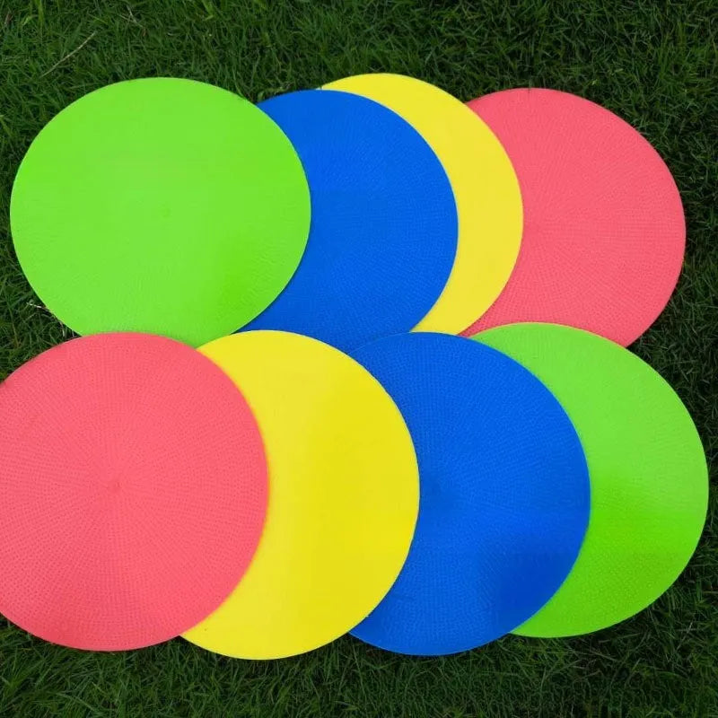 Yellow TPE football landmark pad disc on grass, 23cm diameter flat sports training marker.