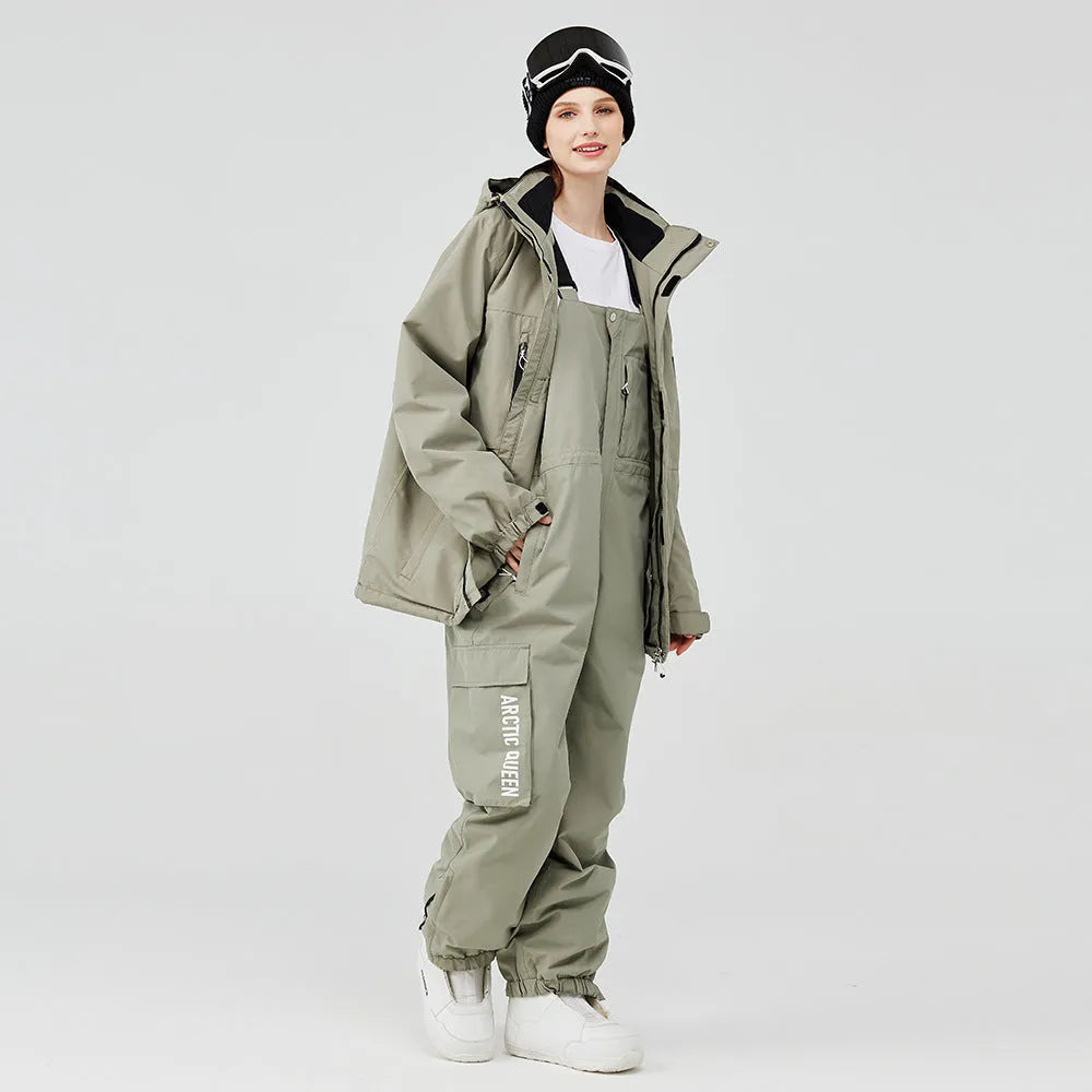 Blue and black unisex waterproof winter ski suit with top and pants for snow sports