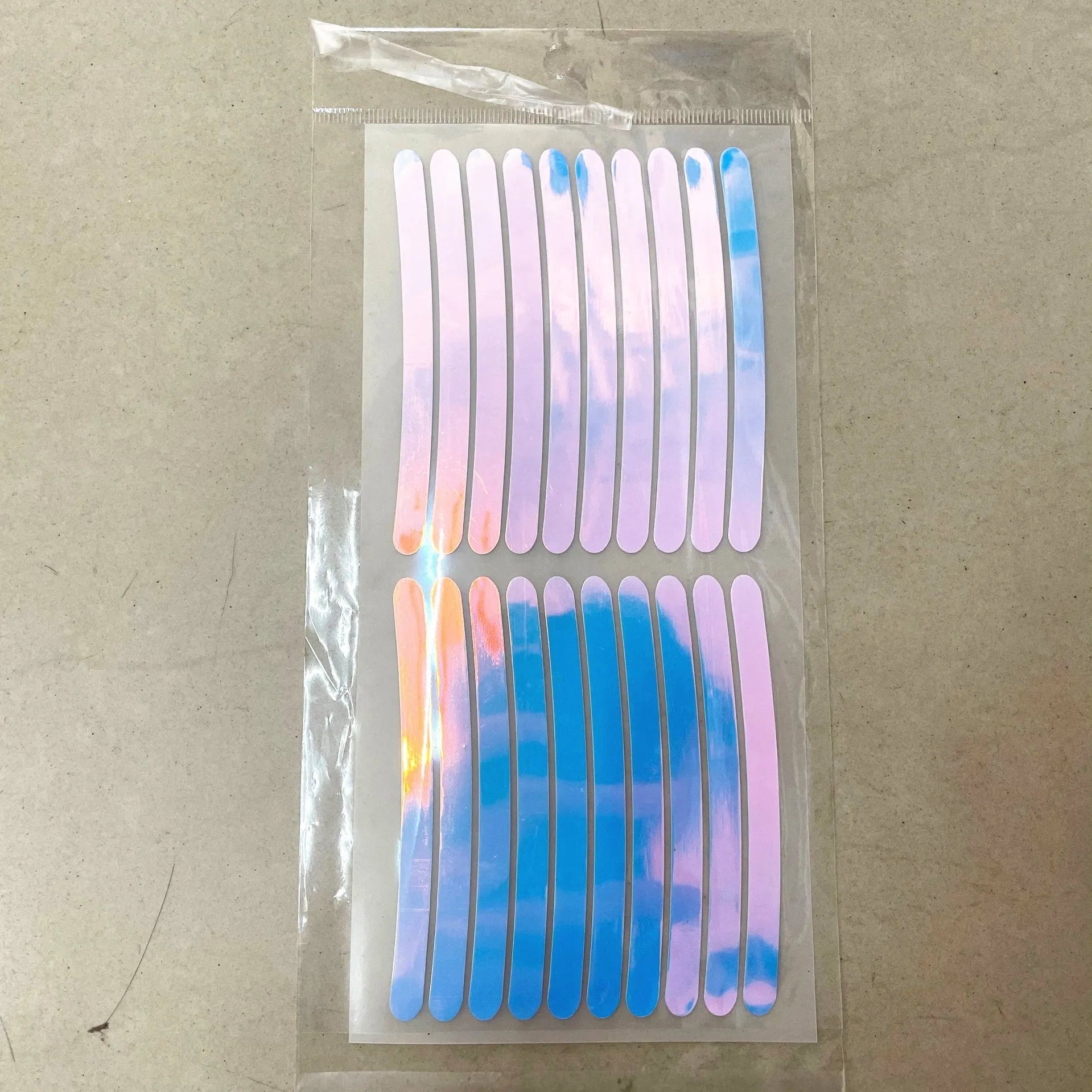 20-piece pack of arc-pattern reflective wheel hub stickers in multiple colour options