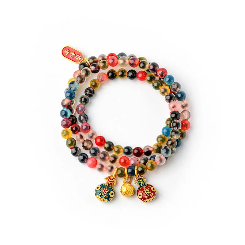 Dzogchen unisex agate bracelet with grey coloured glaze on wrist