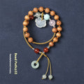 Hand-woven women's ebony bracelet with sandalwood fragrance and traditional double ring design