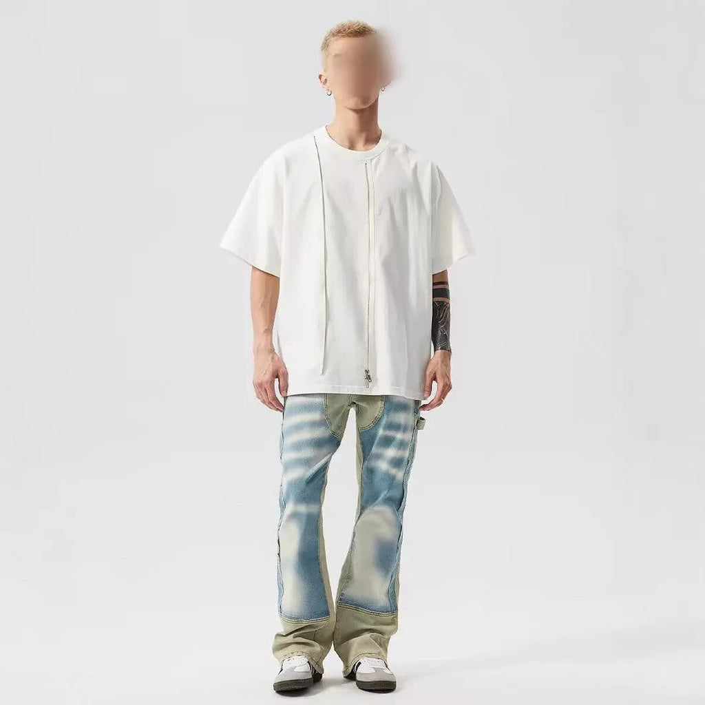 Retro yellow and blue patchwork splash-ink damaged design denim jeans on a mid-waist fit.