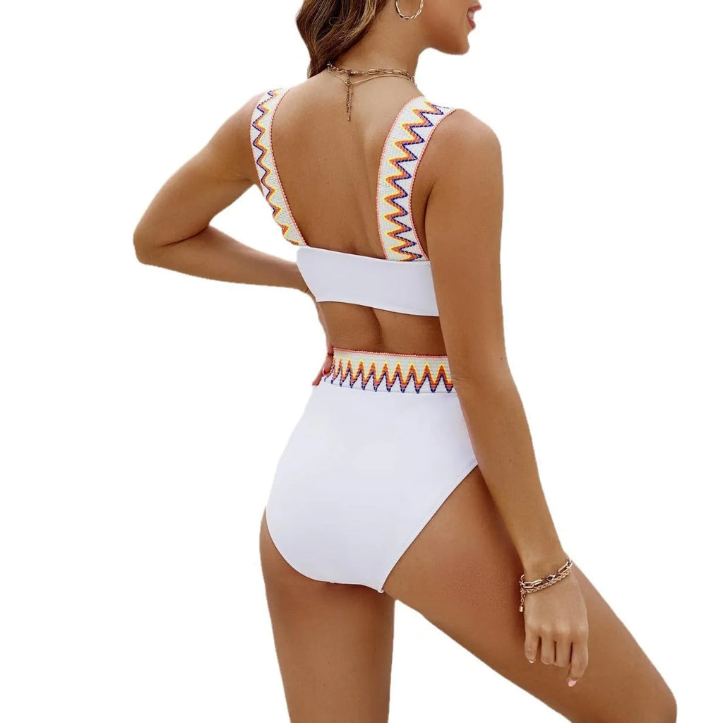 Black and white women's lace-up front swimsuit with high-waisted bikini bottoms