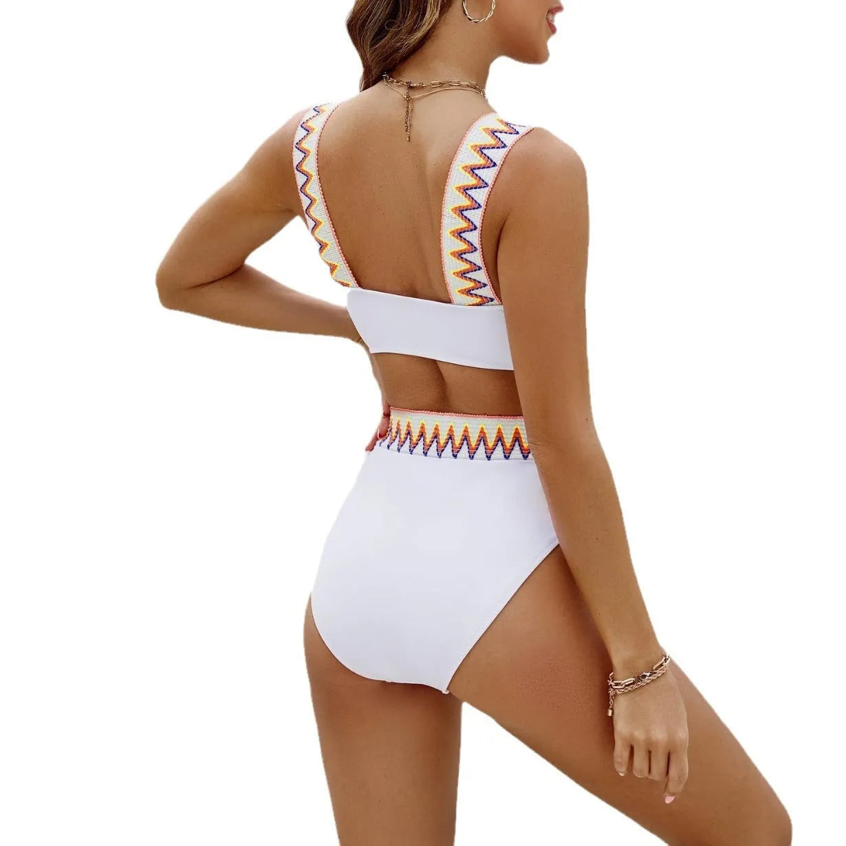 Black and white women's lace-up front swimsuit with high-waisted bikini bottoms