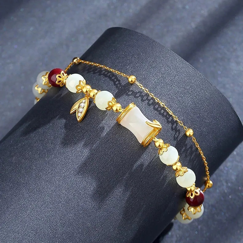 Bamboo bracelet with glass flower charm and Ruyi pattern in beige, green, light green, or white