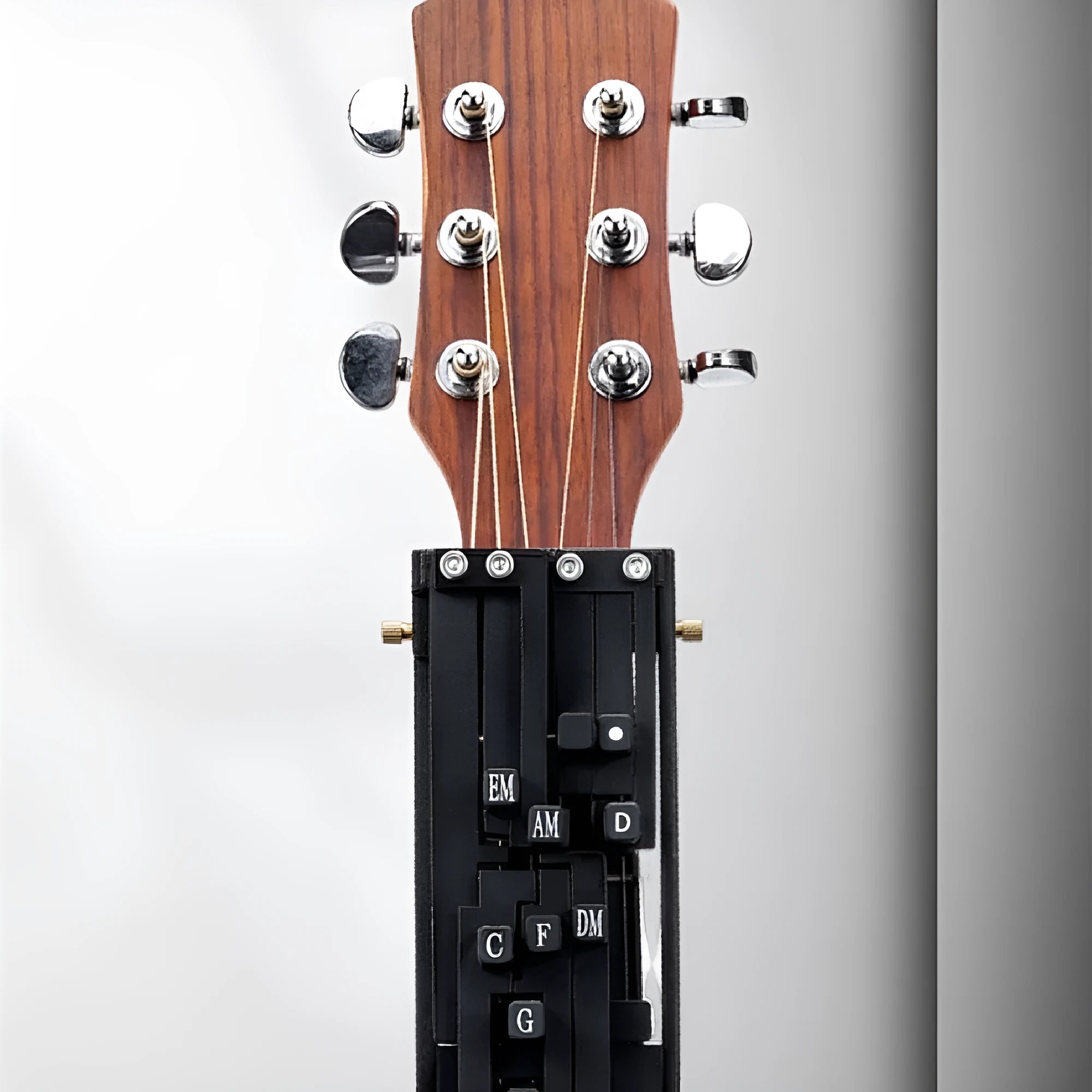 Black automatic guitar chord practice device for folk playing and singing coordination