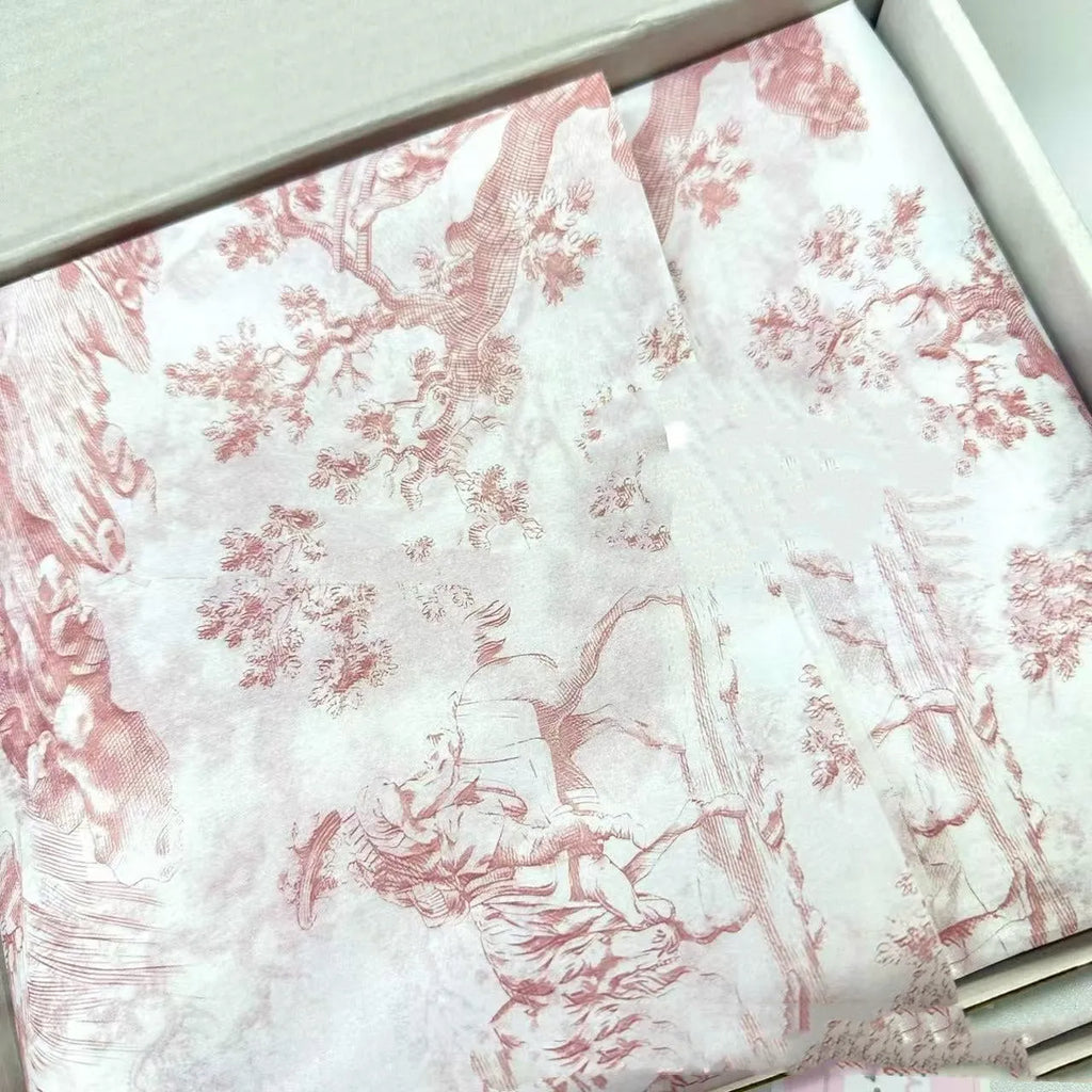 Single sheet of pink and purple French romance pattern Mg tissue paper measuring 50x70cm.