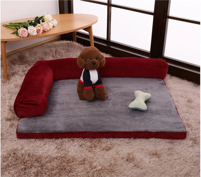 Corduroy bolster dog bed in grey with a removable cover, shown in a large (L) size on a hardwood floor.