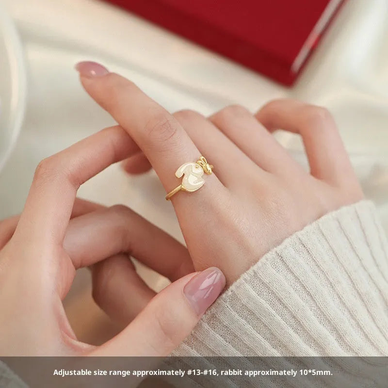925 sterling silver jade hare ring with round shape and adjustable opening on white background