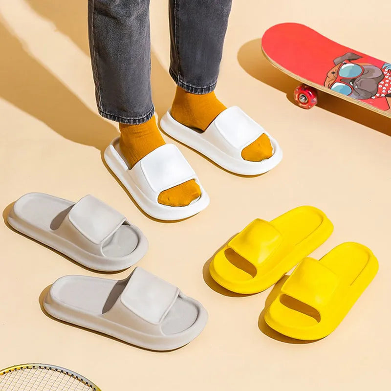 Unisex thick-soled EVA flip flop slippers in multiple colours on a white background.
