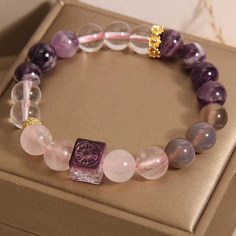 Purple women's bracelet with natural amethyst stones and crystal rhinestone design, measuring 10mm.