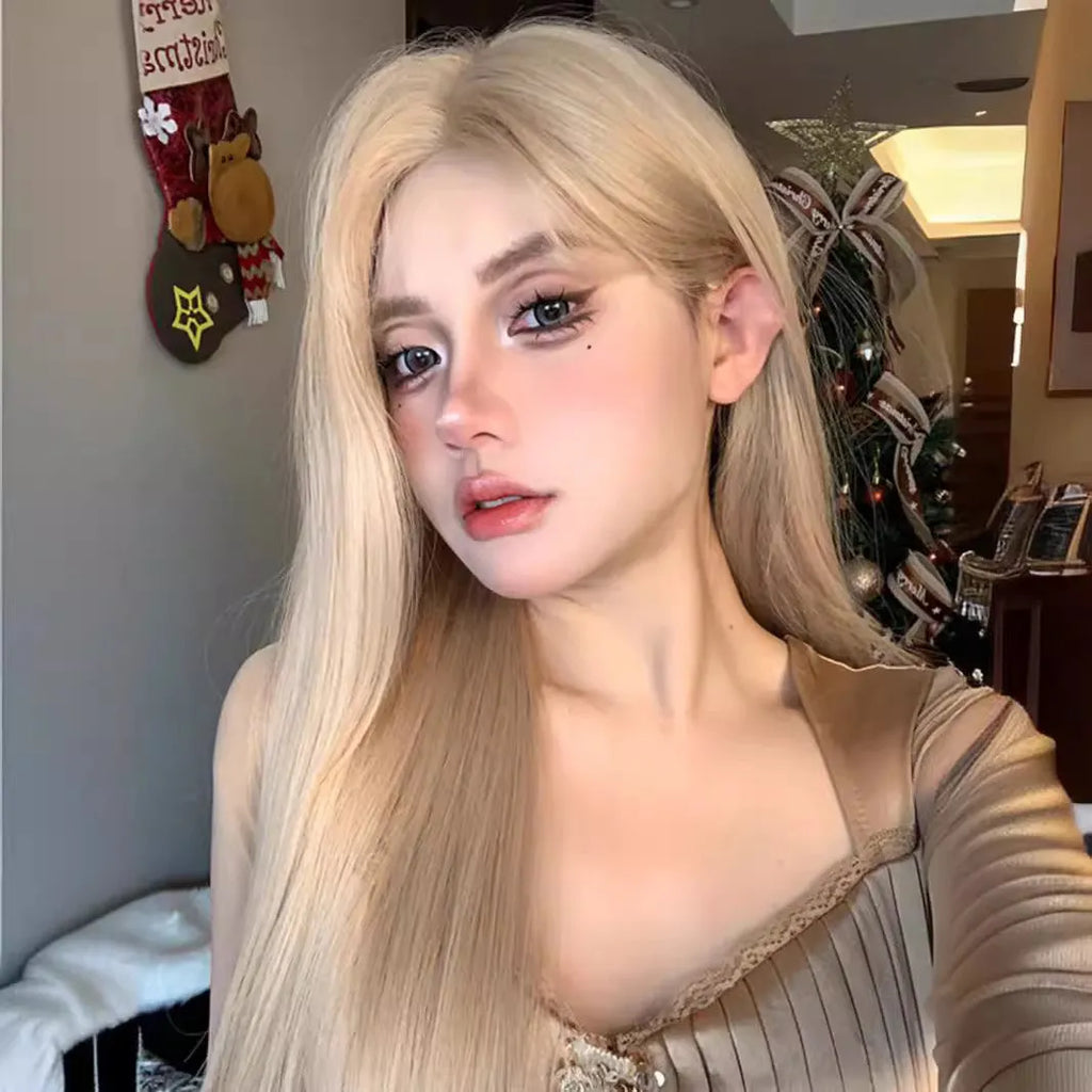 Women's long straight milk tea blonde gold wig with hair net on display