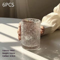 A solid colour begonia patterned glass water cup shown in both tall 380ml and short 250ml sizes.