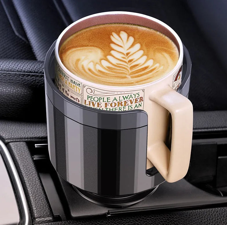 Matte black car cup holder expander with adjustable base for large drink bottles and travel cups.