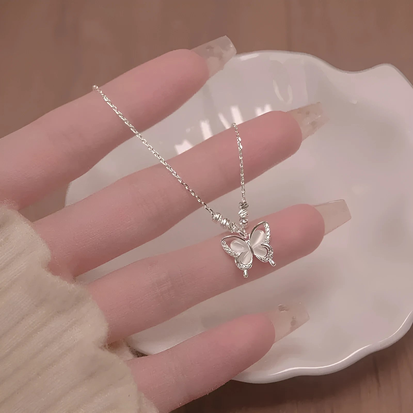 Women's square line opal butterfly necklace in 925 silver with a cross chain.