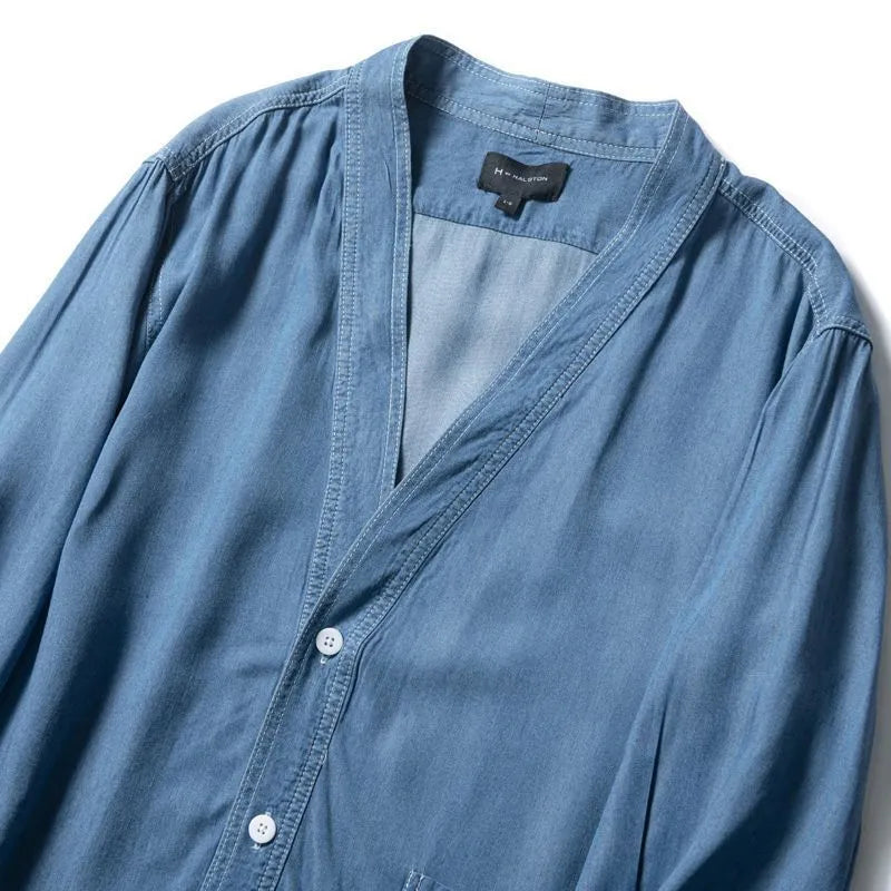 Men's dark blue casual denim coat with V-neck collar and chest pocket on a hanger.