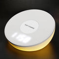 White 10W wireless charging pad with digital clock display and alarm functions