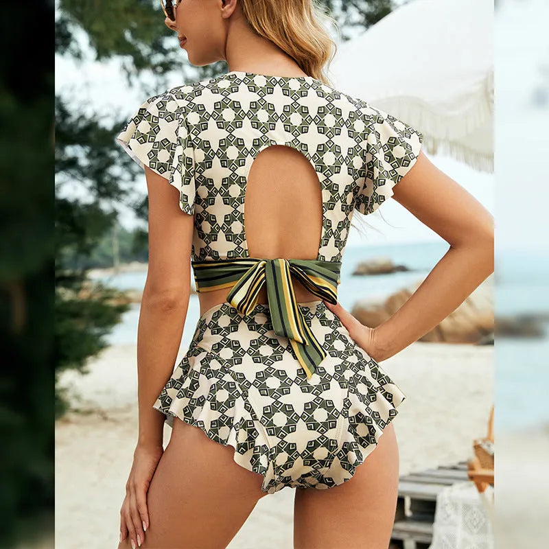 Green women's bikini set with flounced backless lace-up top and shorts.