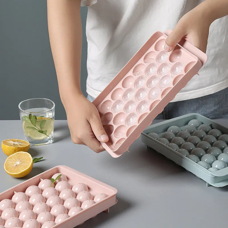 Sky blue 3D round ice ball mould tray with spherical ice cavities for home bar use