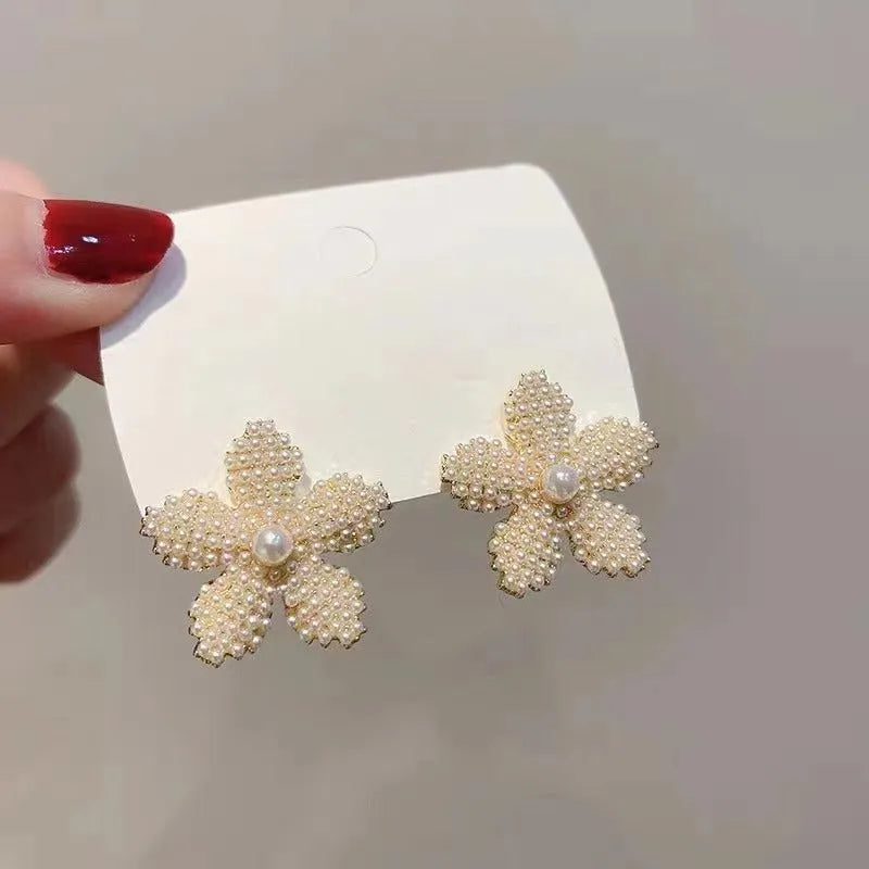 Korean style alloy earrings with pineapple and starfish motifs in gold colour, featuring inlaid artificial gems