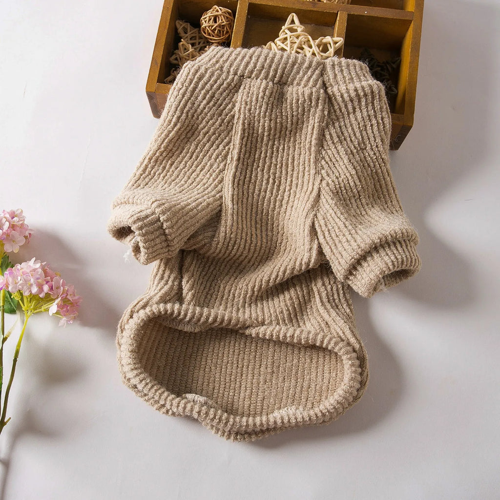 Brown cloth sweater pullover on a small dog, suitable for Bichon or Pomeranian breeds.