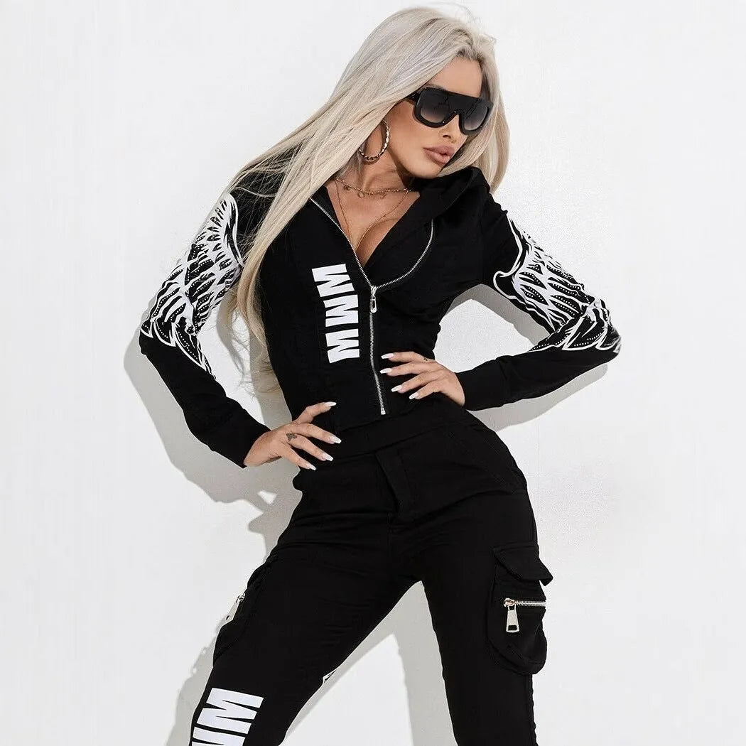 Black women's hooded tracksuit with wings print, featuring a zip-front top and matching trousers.