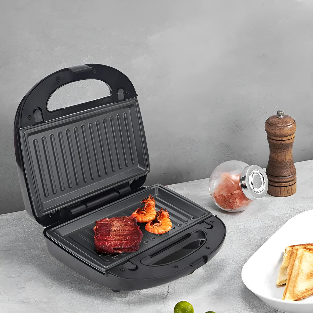 Black double-sided electric sandwich pan with non-stick coating and brushed stainless steel top