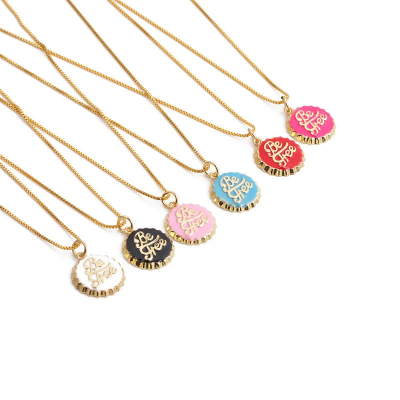 Copper bottle cap pendant necklace with gold plating on a 40cm chain, shown in multiple colour options.