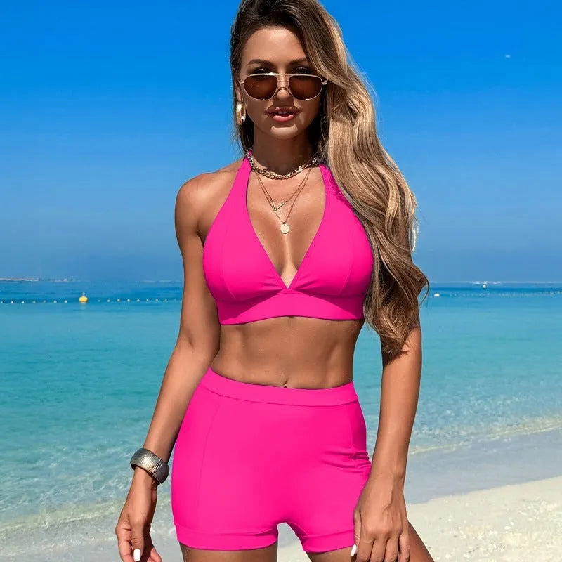 Women's two-piece nylon bikini swimsuit shown in one of four colour options: black, royal blue, pink, or purple blue.