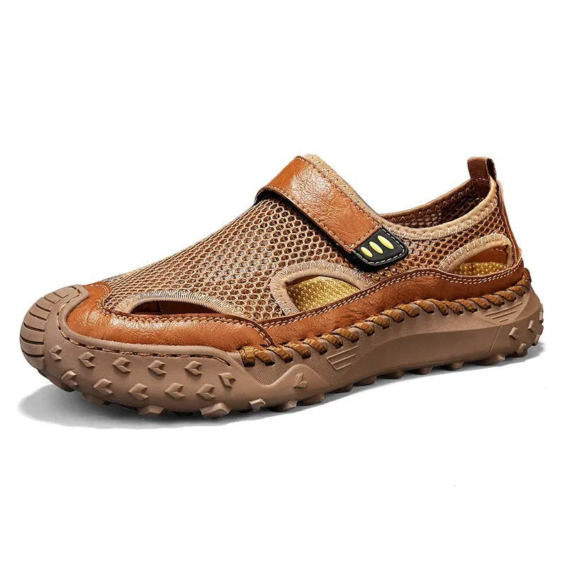 Men's black casual sandals with mesh upper and Velcro strap on a rubber sole.